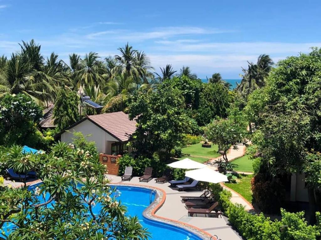 an aerial view of a resort with a swimming pool at Bao Quynh Bungalow in Mui Ne