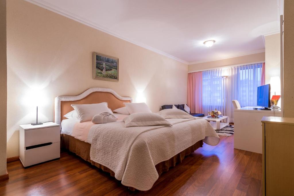Postel nebo postele na pokoji v ubytování Hotel Century