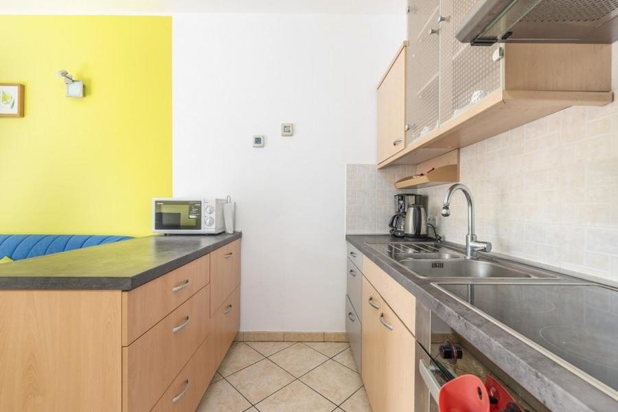 Kuchnia lub aneks kuchenny w obiekcie Apartment Carigo