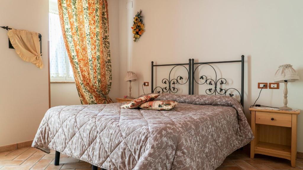 Postel nebo postele na pokoji v ubytování Agriturismo Le Tese