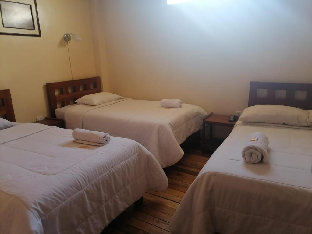 Postel nebo postele na pokoji v ubytování Suyay B&B