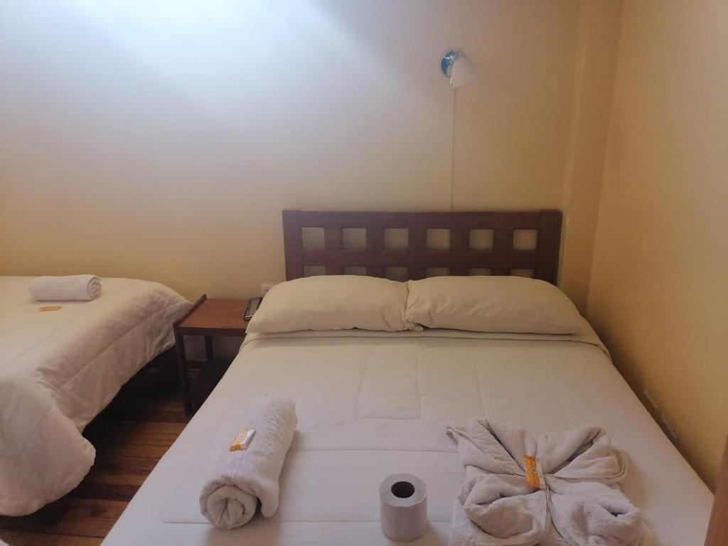 Postel nebo postele na pokoji v ubytování Suyay B&B