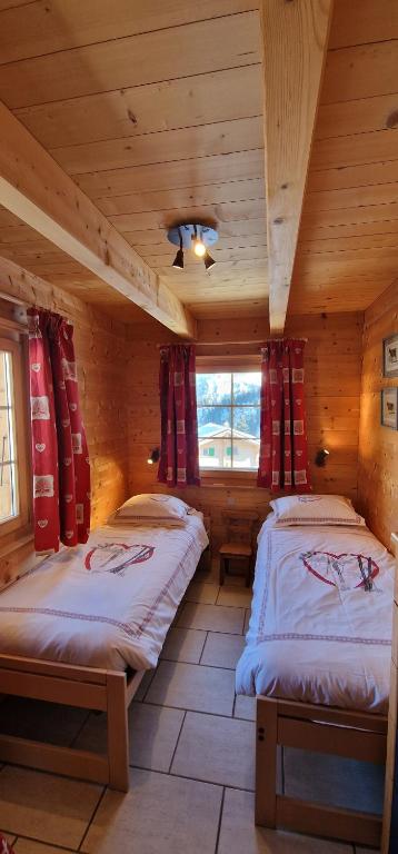 Postel nebo postele na pokoji v ubytování Chalet Casteol