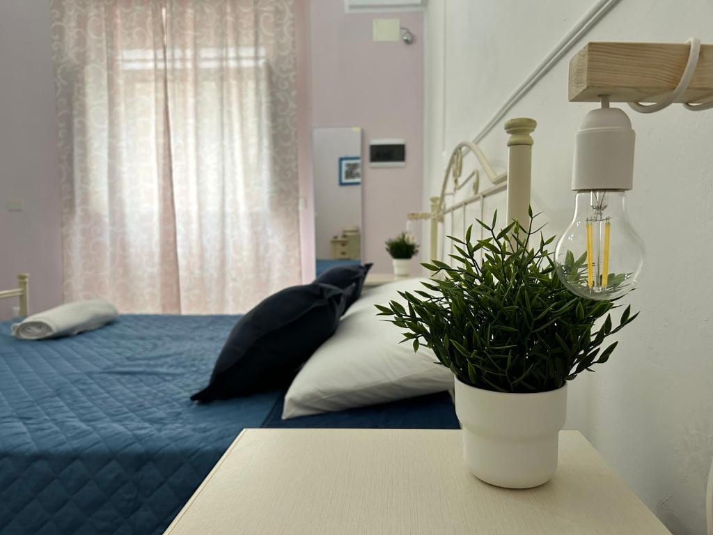 Postel nebo postele na pokoji v ubytování Meta Salento Rooms