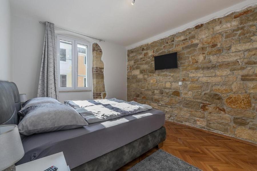 TV a/nebo společenská místnost v ubytování Penthouse Lorena