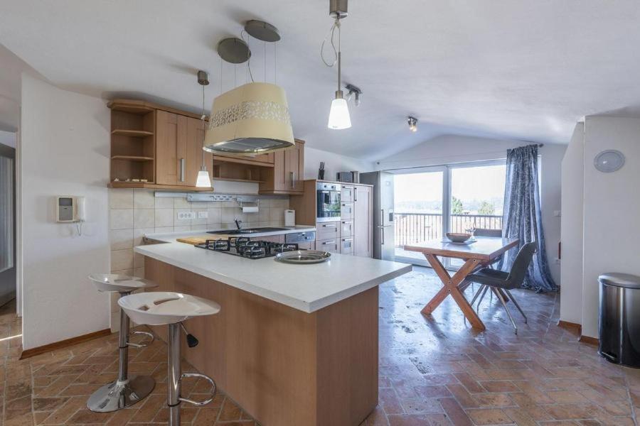 Kuchyň nebo kuchyňský kout v ubytování Penthouse Lorena