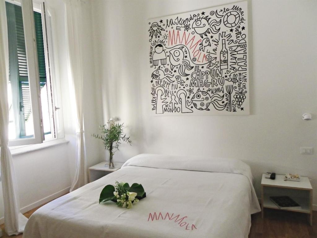 Postel nebo postele na pokoji v ubytování Affittacamere Altamarea