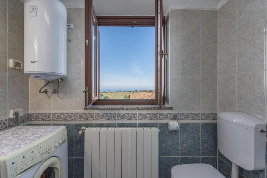 Koupelna v ubytování Appartment Arrburoni