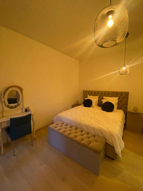 Postel nebo postele na pokoji v ubytování B&B Art and Sleep
