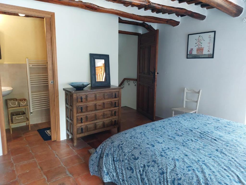 Postel nebo postele na pokoji v ubytování Casa de Alguaztar