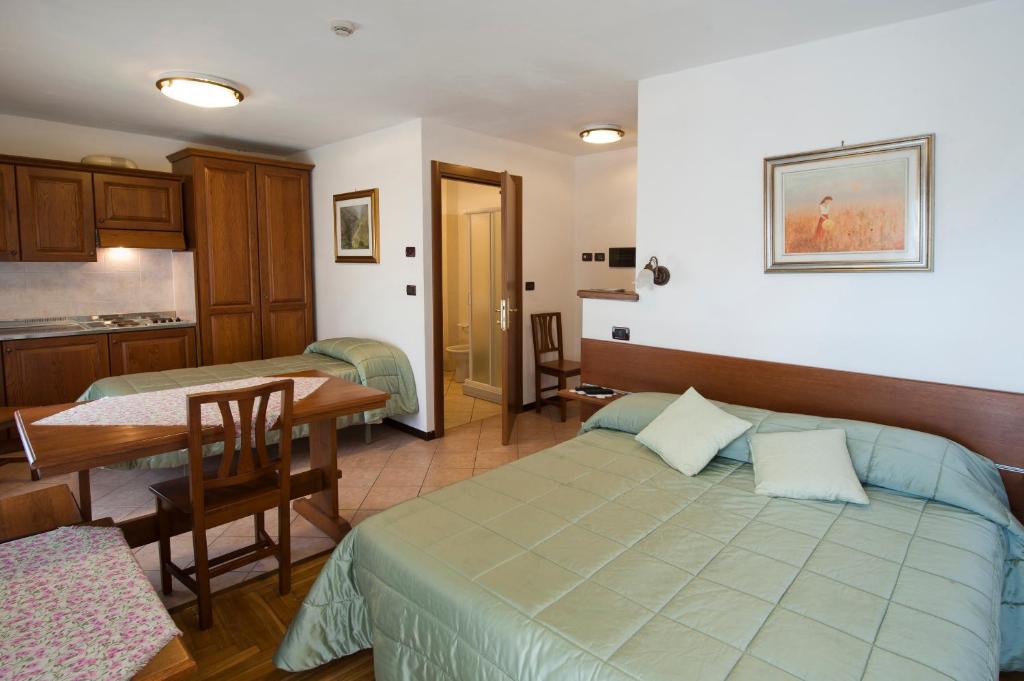 Postel nebo postele na pokoji v ubytování Albergo Castello da Bonino