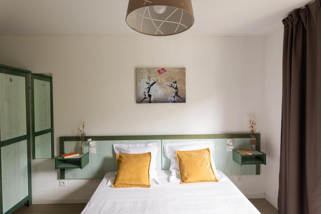 Postel nebo postele na pokoji v ubytování Appart Hotel Corte HR