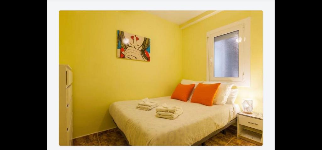 Postel nebo postele na pokoji v ubytování Apartment Llavaneres I