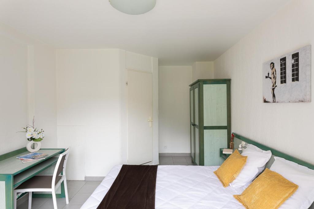 Postel nebo postele na pokoji v ubytování Appart Hotel Corte HR