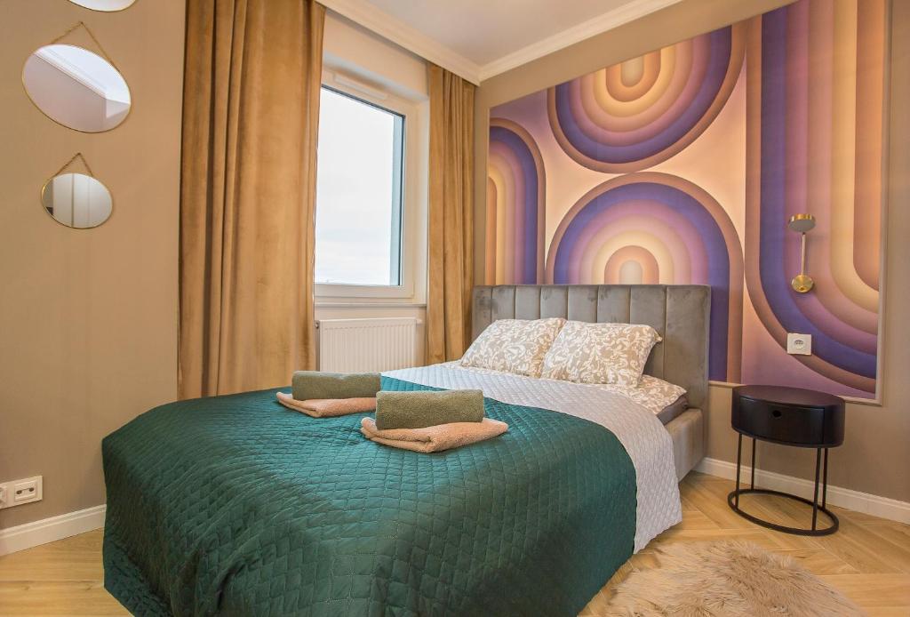 Postel nebo postele na pokoji v ubytování Apartament przy centrum i dworcu
