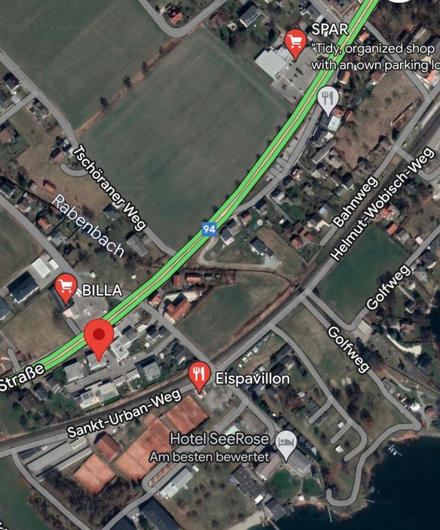 a map of a road with red dots at Ferienwohnung Fischerweg in Bodensdorf