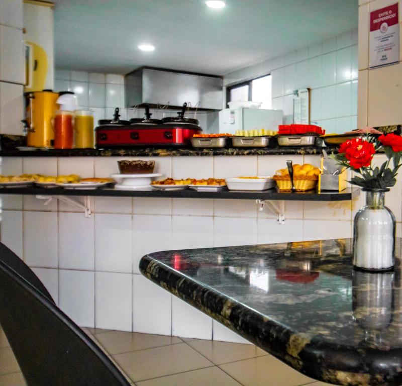 Kuchyň nebo kuchyňský kout v ubytování Hotel Piramide Pituba - Av Paulo VI