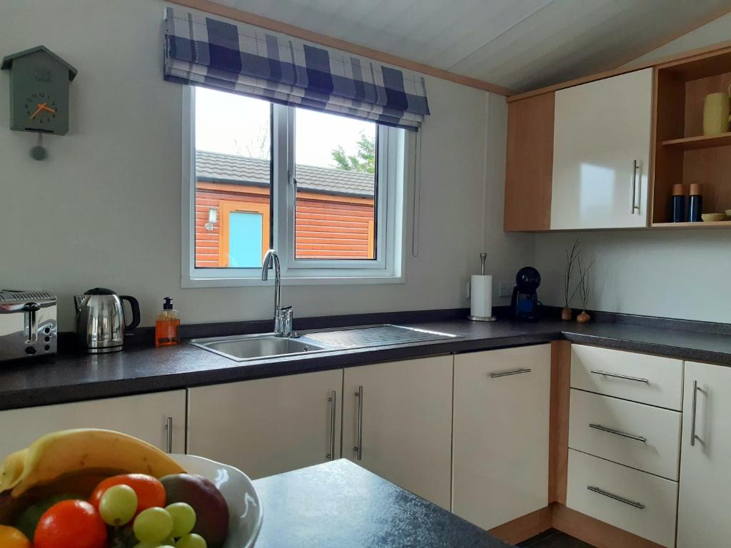 Kuchyň nebo kuchyňský kout v ubytování Sycamore Lodge Auchterarder