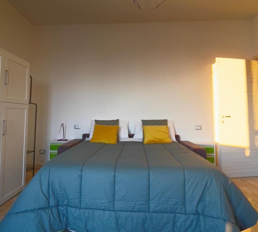 Łóżko lub łóżka w pokoju w obiekcie Smart Silver Apartment Central