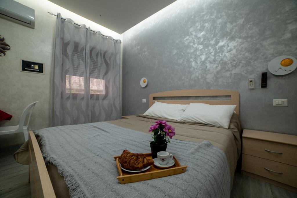 Posteľ alebo postele v izbe v ubytovaní B&B La Colonna