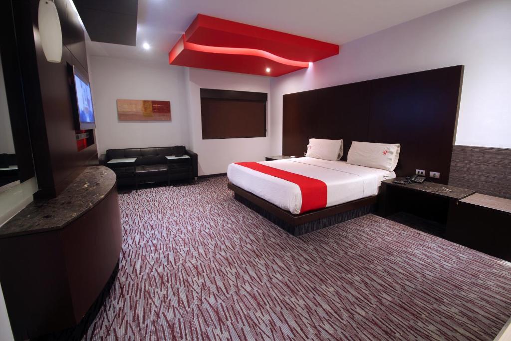 Giường trong phòng chung tại Motel Via