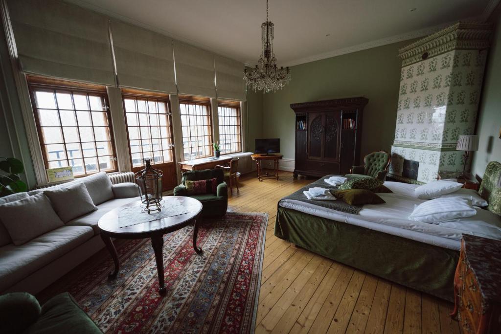 Postel nebo postele na pokoji v ubytování Teleborgs Slott