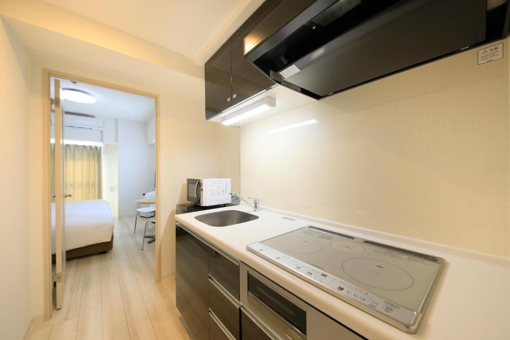 Kuchyň nebo kuchyňský kout v ubytování Bay Hotel Urayasu-ekimae