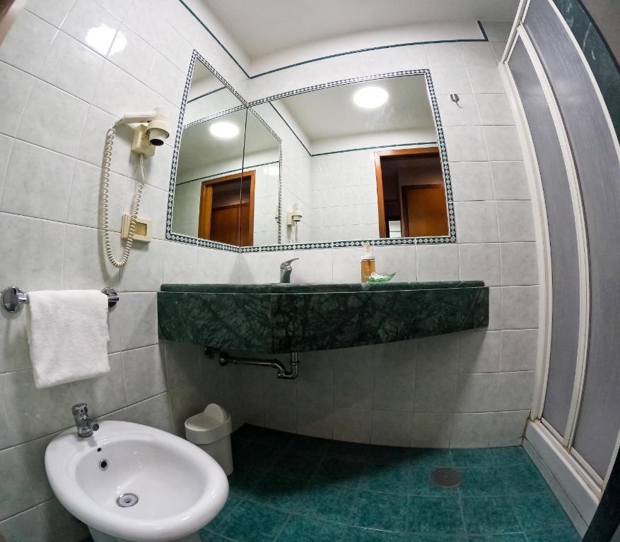 Koupelna v ubytování Hotel Cervia