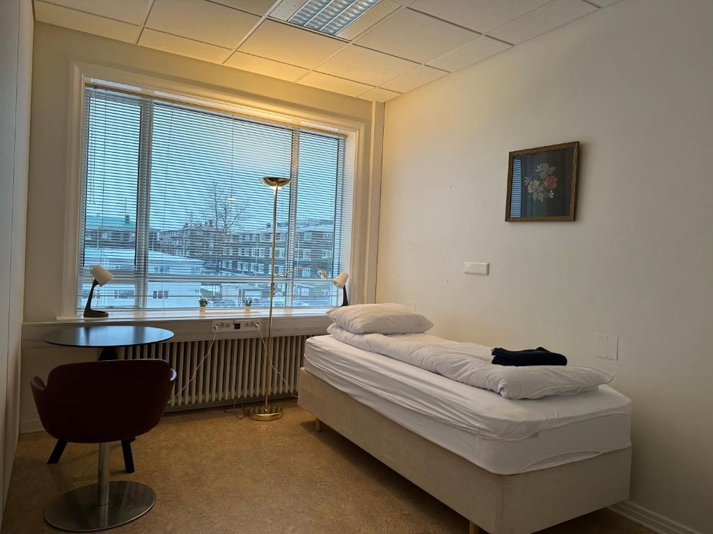 Postel nebo postele na pokoji v ubytování Baron's Hostel