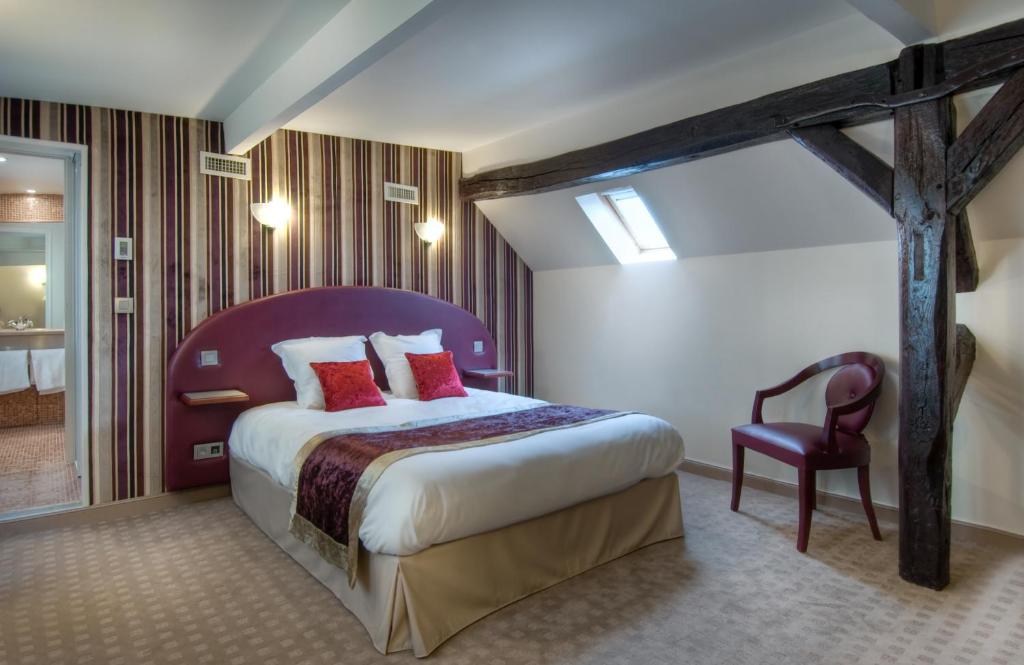 Postel nebo postele na pokoji v ubytování Hotel Opéra d'Antin