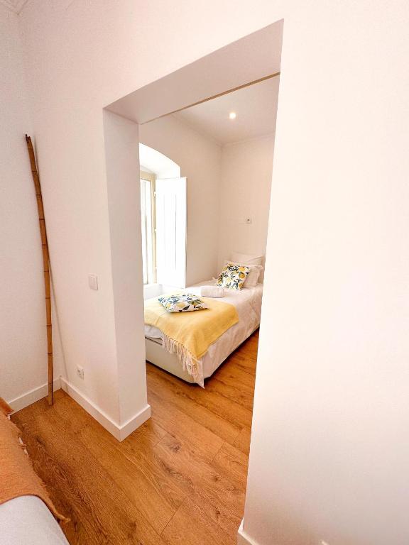 Postel nebo postele na pokoji v ubytování 4Cantos Alentejo