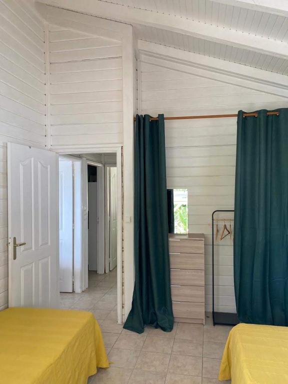 Postel nebo postele na pokoji v ubytování VILLA KARAT