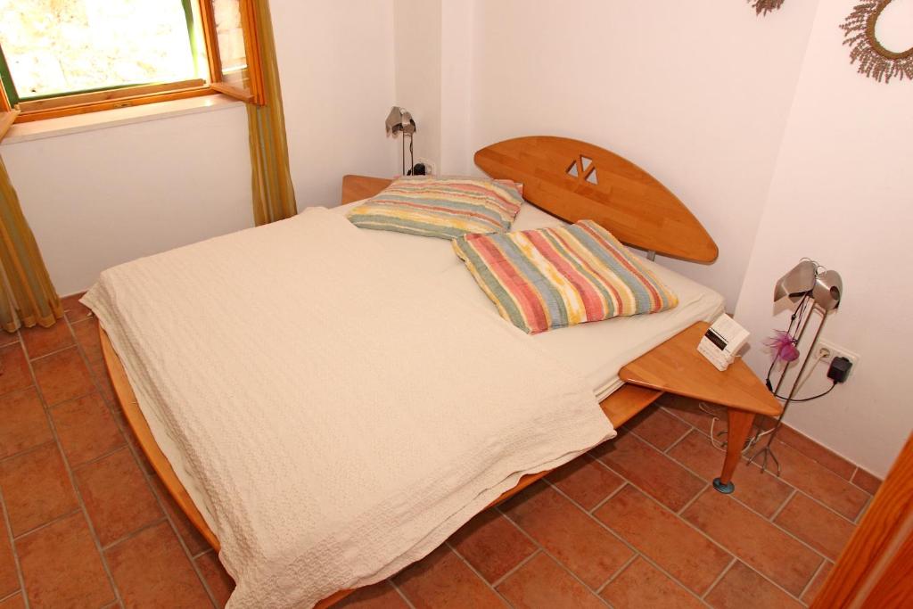 Łóżko lub łóżka w pokoju w obiekcie Apartments Mima Hvar