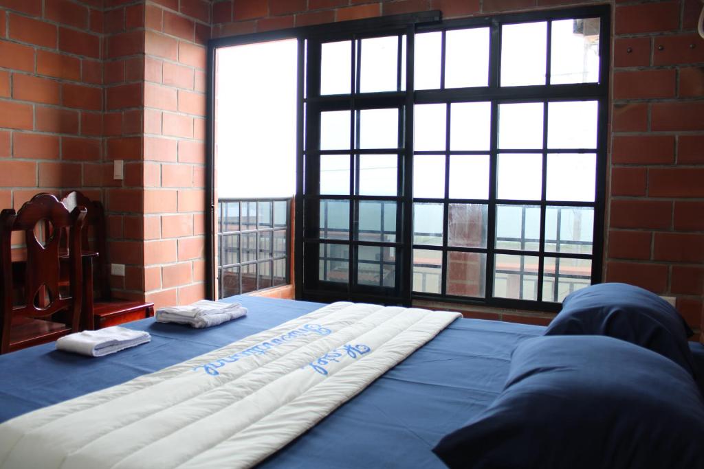 Postel nebo postele na pokoji v ubytování Hotel International