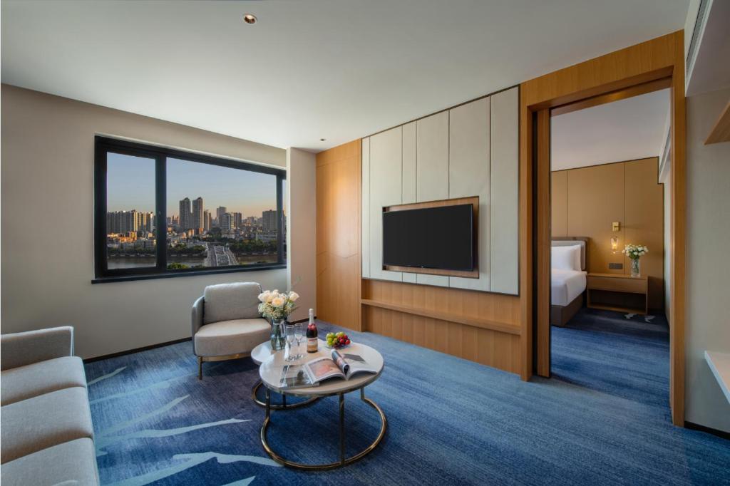 TV a/nebo společenská místnost v ubytování Guangzhou Hotel