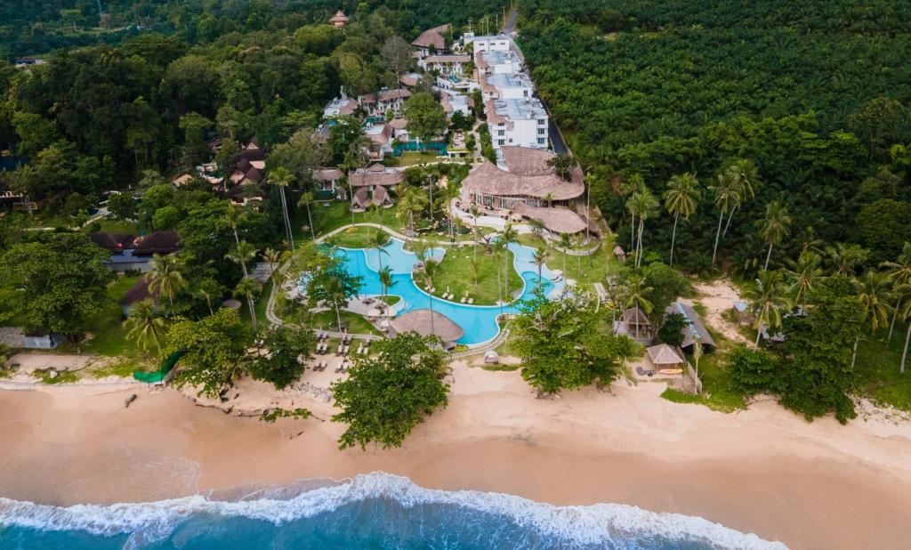 an aerial view of a resort on the beach at Eden Beach Khaolak Resort and Spa A Lopesan Collection Hotel - SHA Extra Plus in Khao Lak