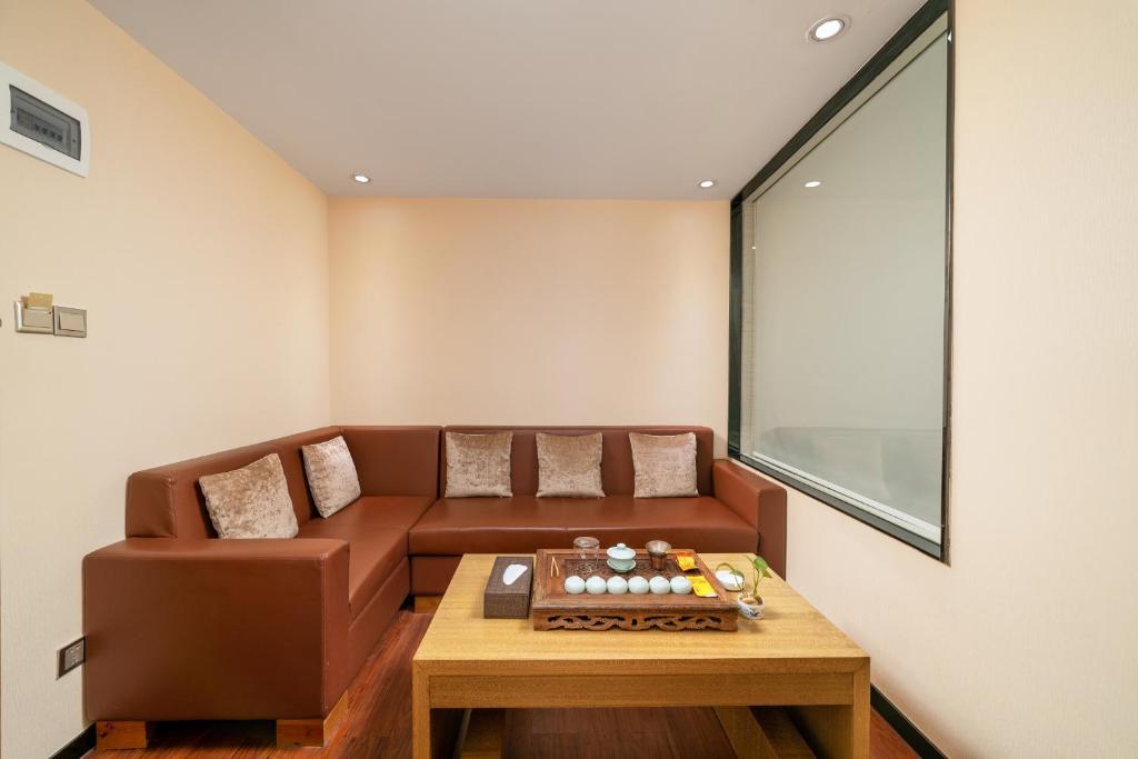 Posezení v ubytování Guangzhou Boyi Hotel