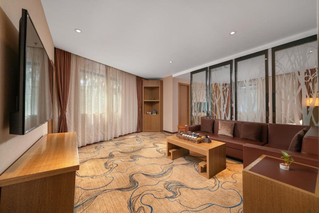 Posezení v ubytování Guangzhou Boyi Hotel