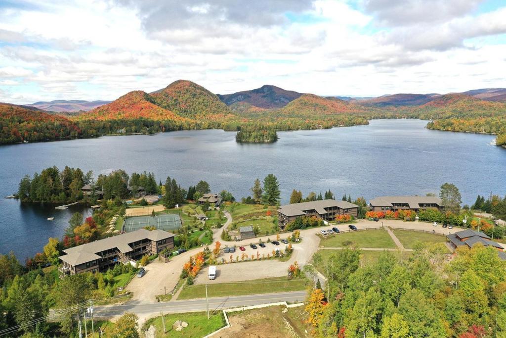 an aerial view of a resort on a lake at Suites sur Lac Superieur-Mont-Tremblant in Lac-Superieur