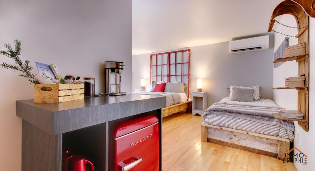 Postel nebo postele na pokoji v ubytování Maison Cadorette