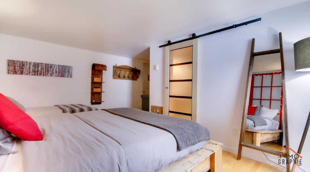 Postel nebo postele na pokoji v ubytování Maison Cadorette