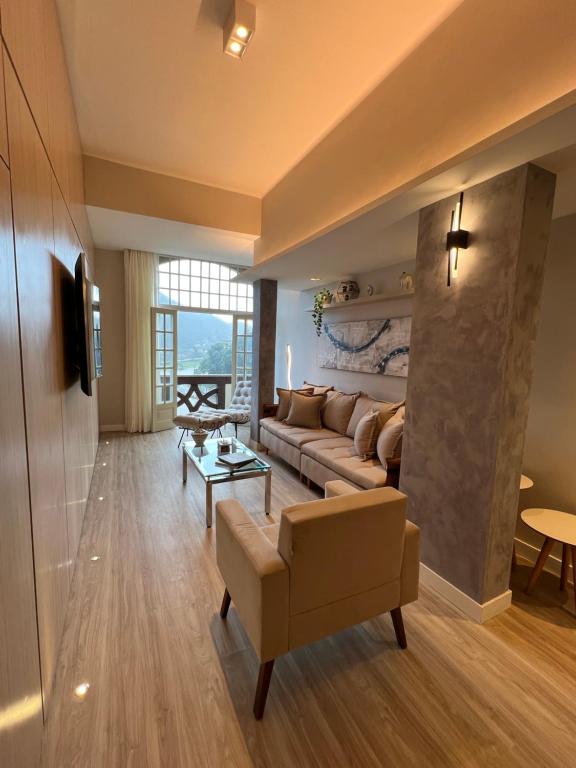 Χώρος καθιστικού στο Palácio quitandinha apartamento luxo