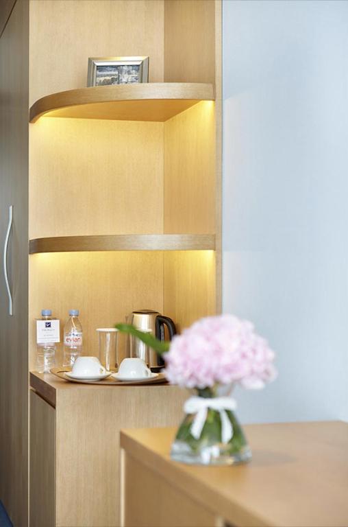 Kuchyň nebo kuchyňský kout v ubytování Eldis Regent Hotel