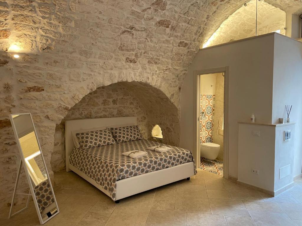 Łóżko lub łóżka w pokoju w obiekcie white room Ostuni