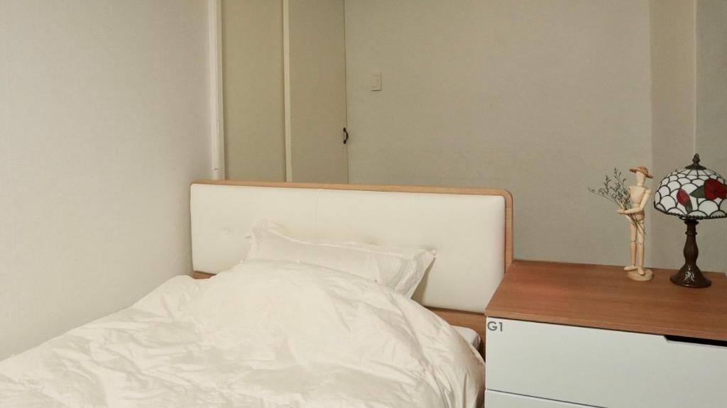 Cama ou camas em um quarto em White Story