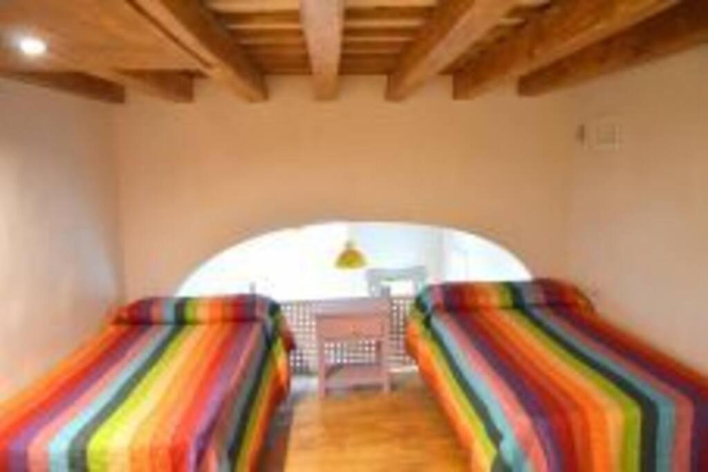 Posteľ alebo postele v izbe v ubytovaní APARTAMENTO VEEDOR BULEVAR DE LOS SUEÑOS