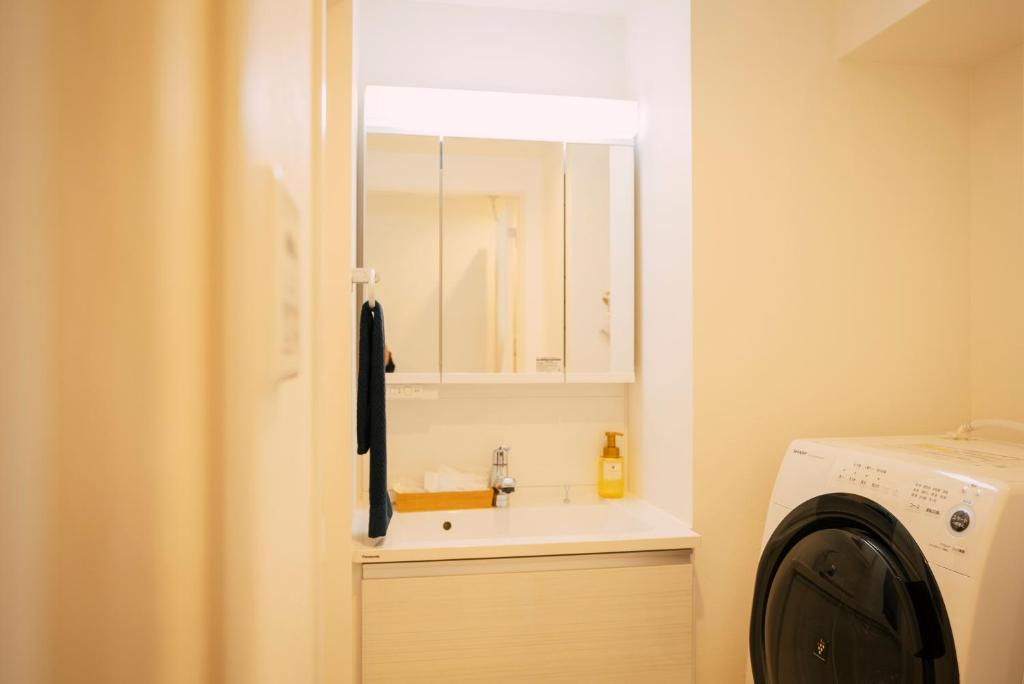 Koupelna v ubytování 谷町君 HOTEL 恵美須町72