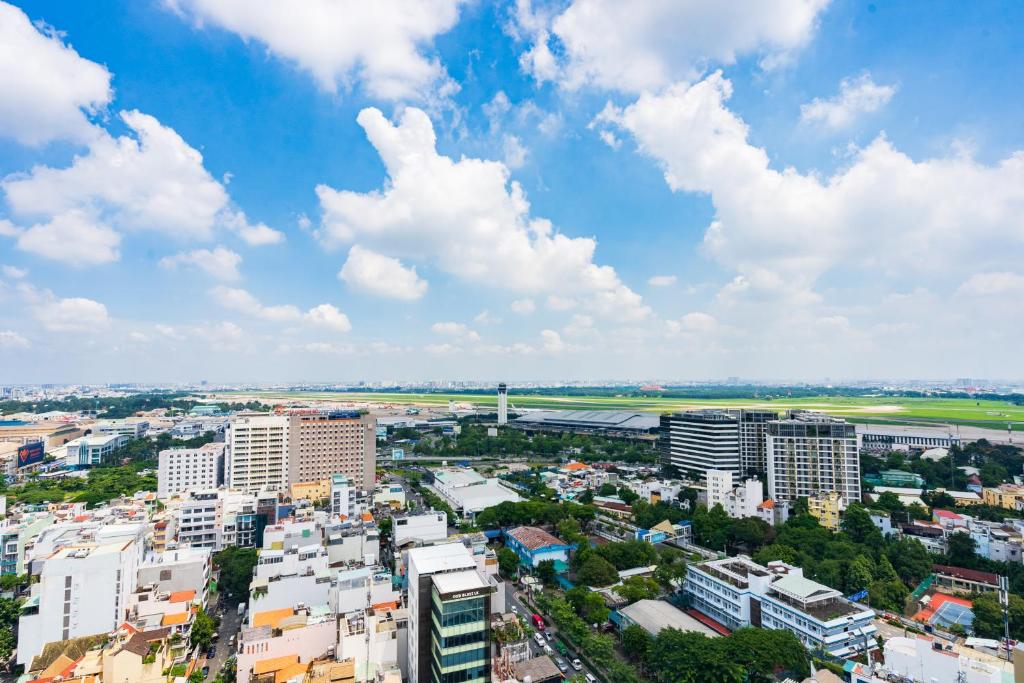 Ho Chi Minh City urban panorama with airport in distance