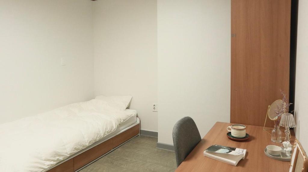 Cama ou camas em um quarto em White Story