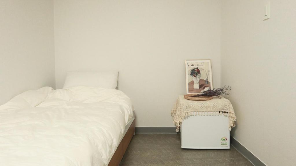 Cama ou camas em um quarto em White Story
